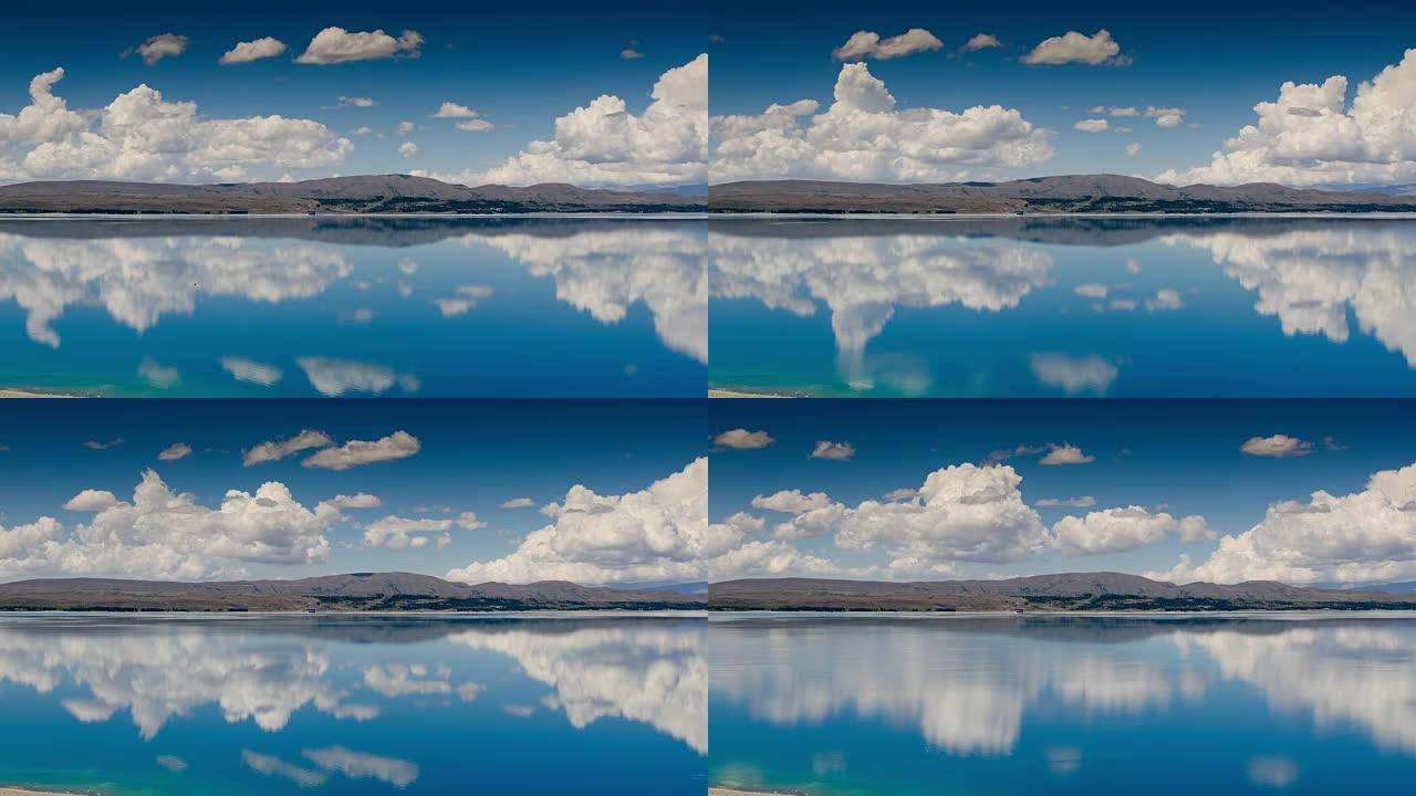 新西兰普卡基山库克国家公园的蓝天和碧绿湖的延时风景