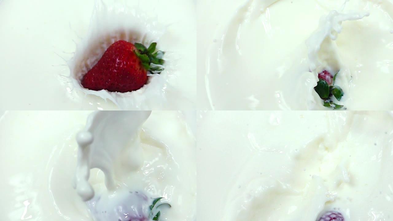 草莓在慢动作中落入乳白色奶油