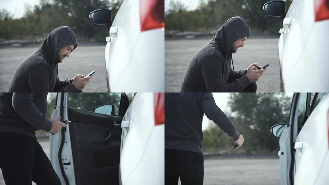 小偷使用手机闯入汽车