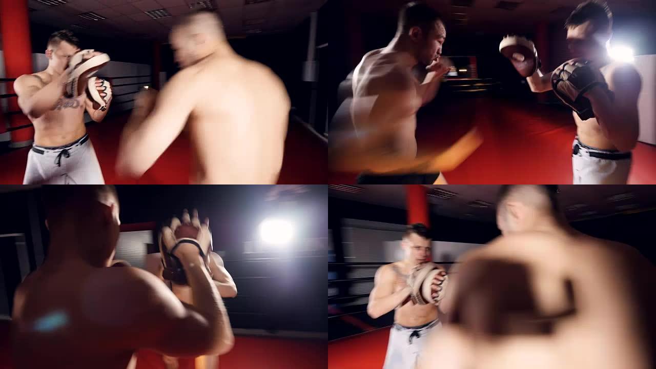 这位拳击手正在与他的对手一起在格斗俱乐部训练