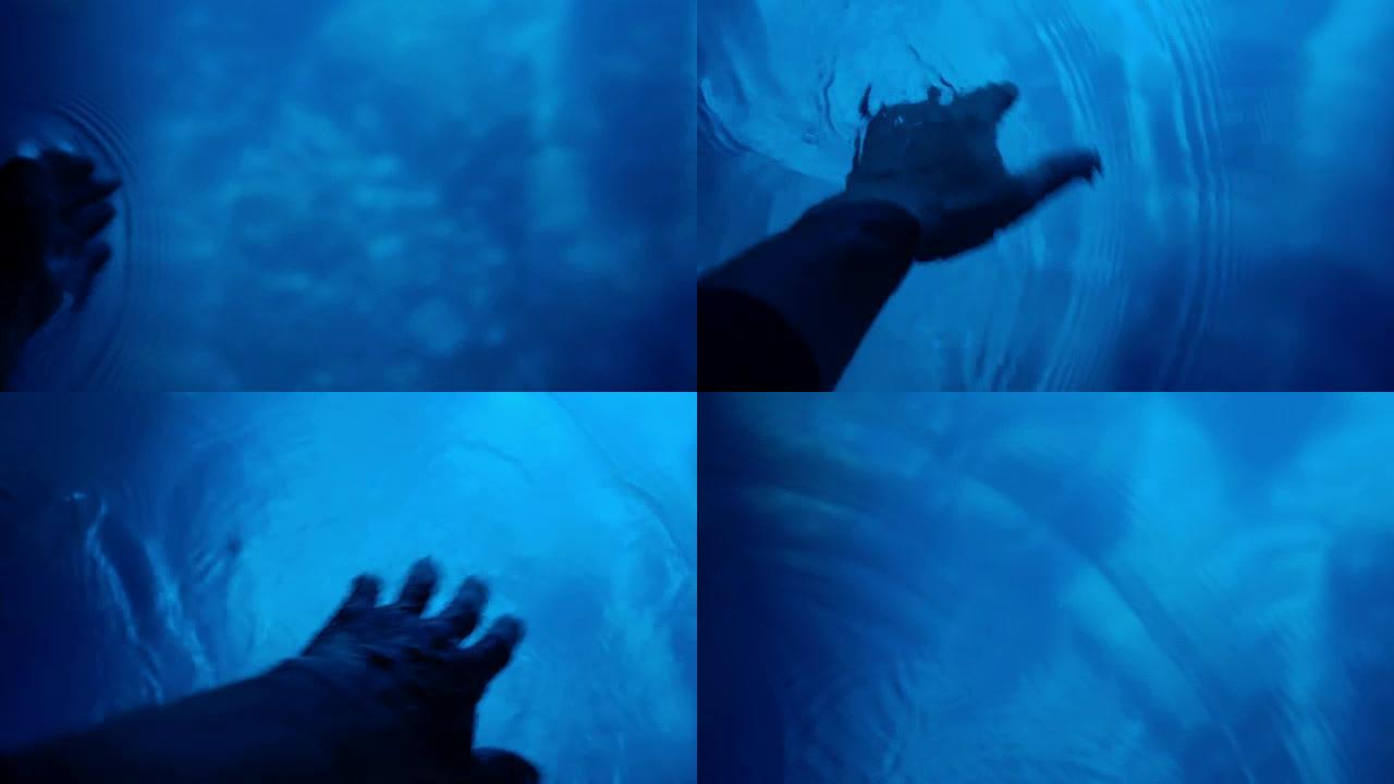 比塞沃岛莫德拉·斯皮尔贾蓝色海洋洞穴中的铜手触摸水