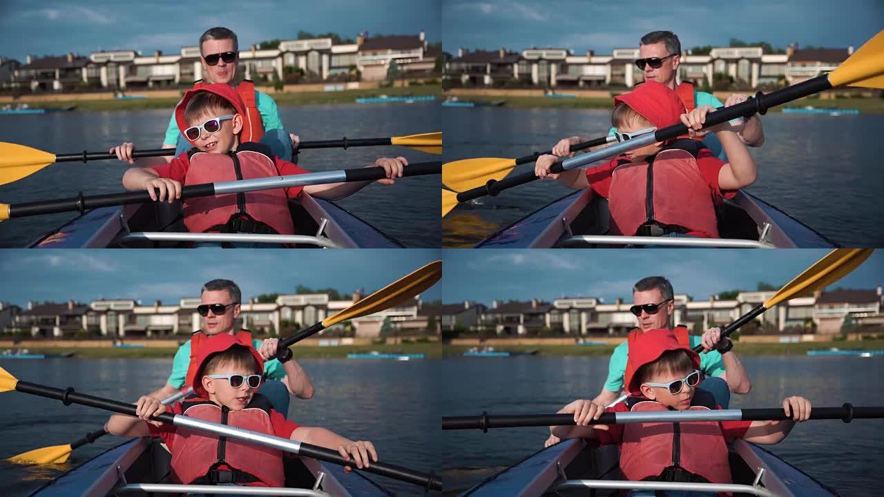 男子和儿子皮划艇