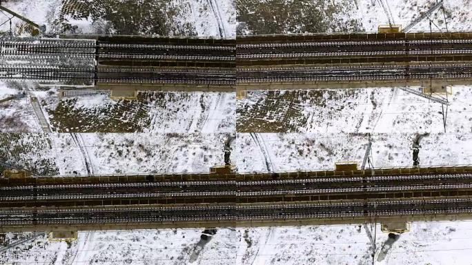 航拍镜头-冬天空铁路。从上方观看