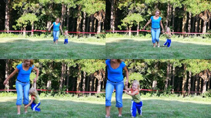快乐的母亲和她的小男孩跑步-HD