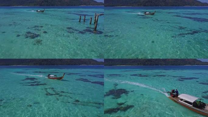 泰国岛、日出海滩、Koh Lipe、沙顿、泰国的热带海滩、长尾船和岩石海岸鸟瞰图，碧绿海水清澈