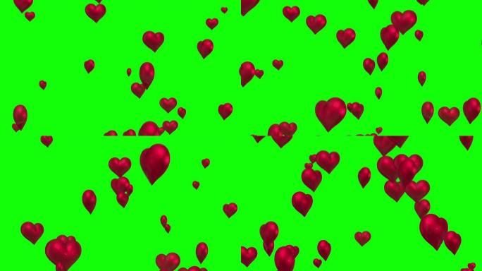 红色的心漂浮在绿色屏幕上