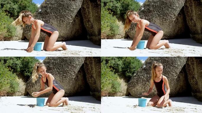 在海滩玩沙子的女孩4k