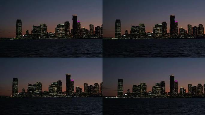 夜间从曼哈顿下城看到的泽西市天际线点亮
