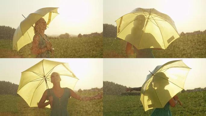 太阳耀斑: 快乐的女人在春雨中旋转，同时拿着黄色的雨伞
