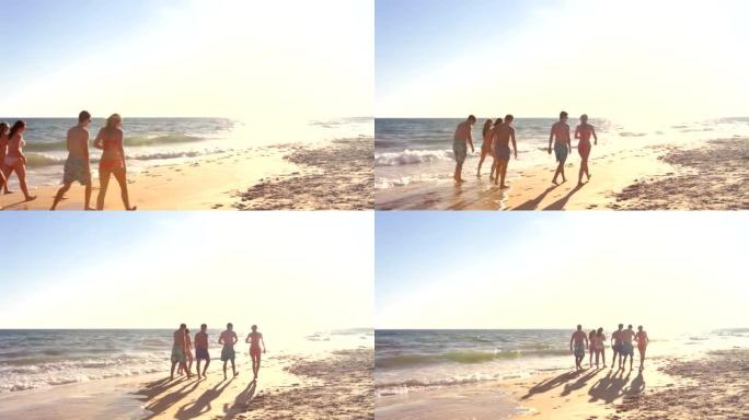 一群十几岁的朋友一起享受海滩度假