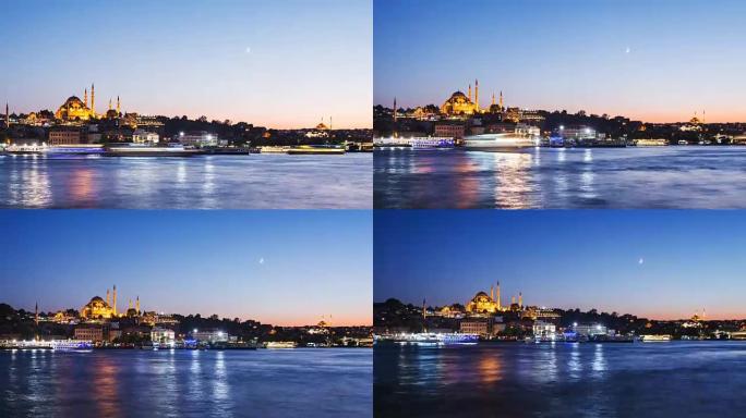缩小伊斯坦布尔城市景观的延时视图，苏莱曼清真寺和游船在夜间漂浮在博斯普鲁斯海峡