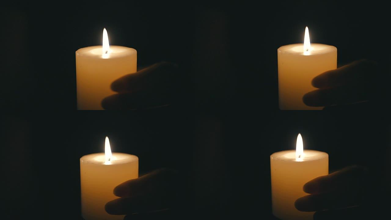 黑暗中手握蜡烛