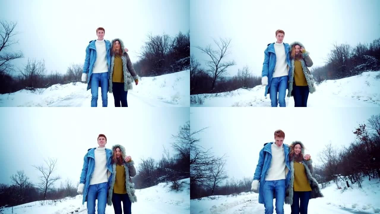 微笑的夫妇享受冬季散步