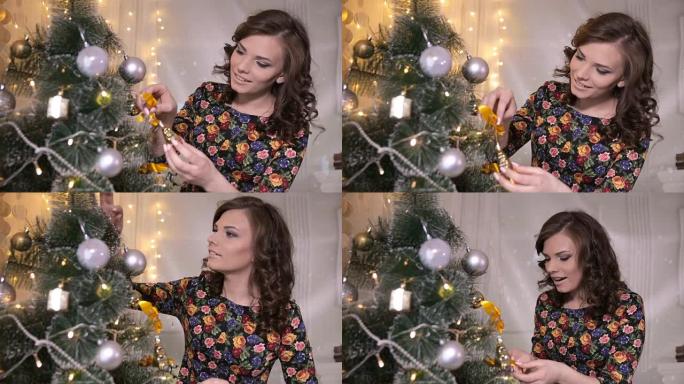 美丽的女孩，年轻的女人装饰圣诞树，把新年玩具和球放在圣诞树上