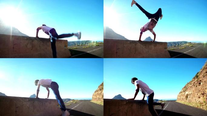 Breakdancer通过在墙上保持平衡来测试自己的健康和力量