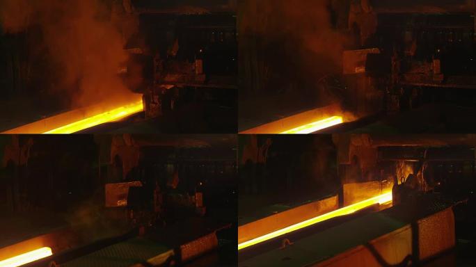 重工业机器加工熔化燃烧热金属棒。
