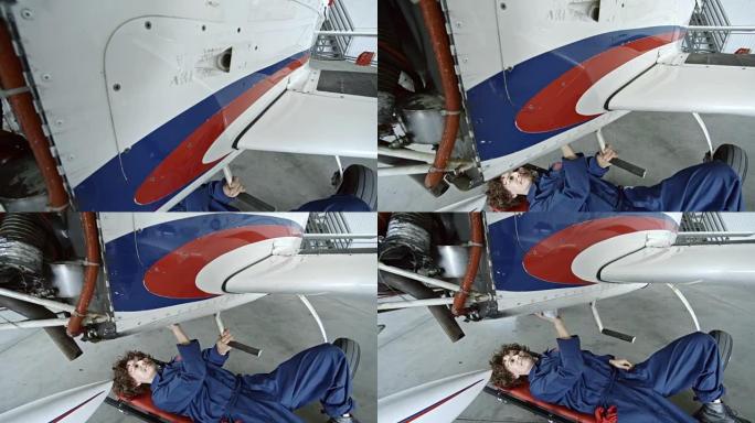 清洁飞机的女飞机维修工