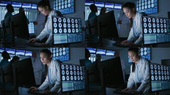 在现代实验室的个人计算机上工作的女科学家/神经科医生。医学研究科学家在神经生理学，科学，神经药理学领