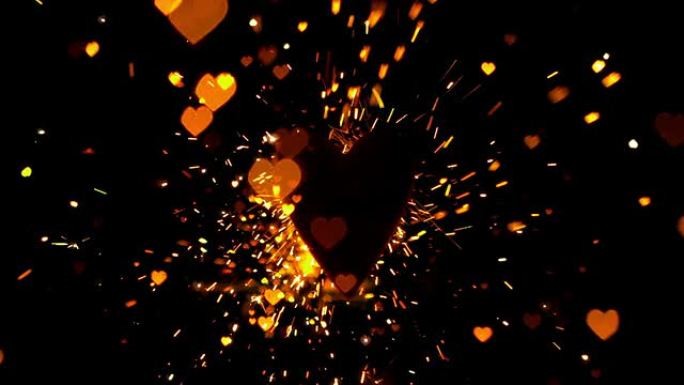 金色五彩纸屑和火花在心脏上飞扬