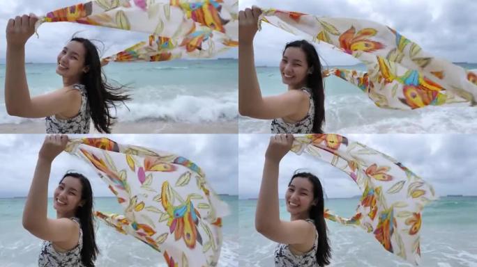 女人在风，海拿着围巾