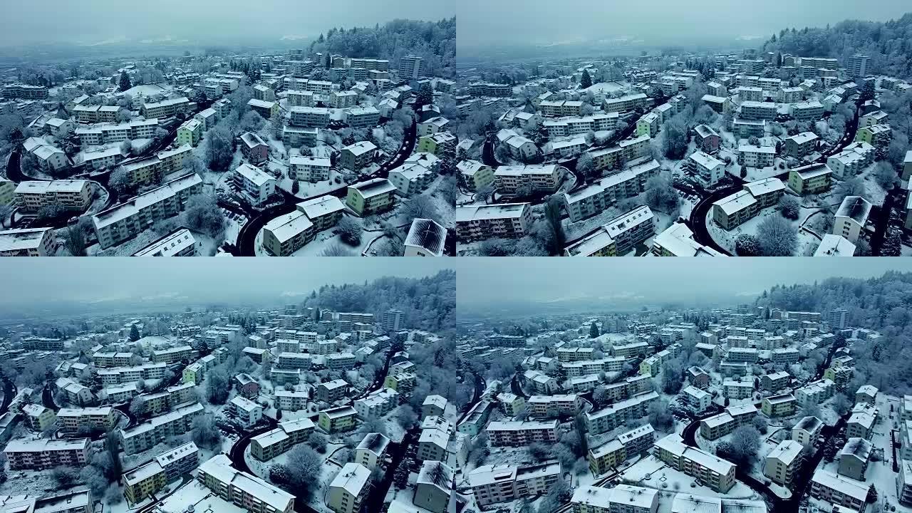 Arial shot of snow covered village in wintertime