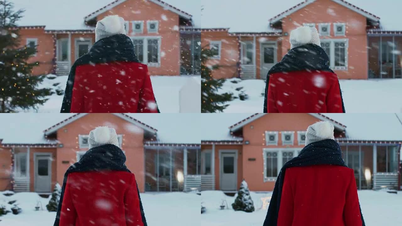 一个冬天，穿着红色外套的美丽年轻女子回到家，她穿过后院走进她田园诗般的房子。软雪正在下。