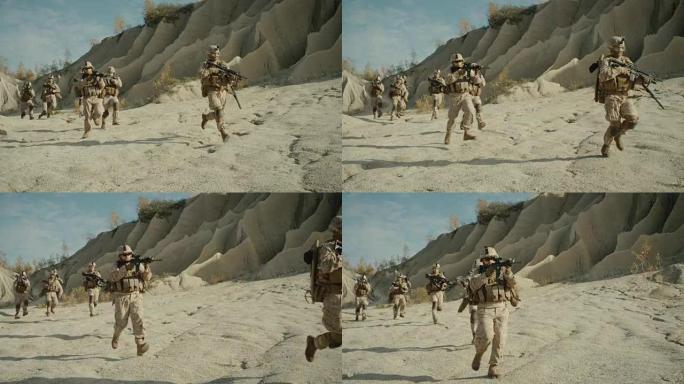 全副武装的士兵在沙漠中奔跑。显示运动。