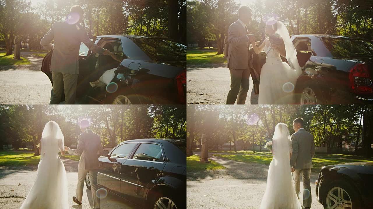 新郎帮助新娘下车。