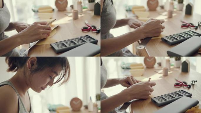 年轻的亚洲妇女为自己动手修理时钟