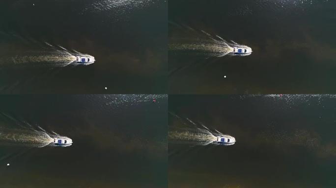 机动船在河上航行的无人机镜头。