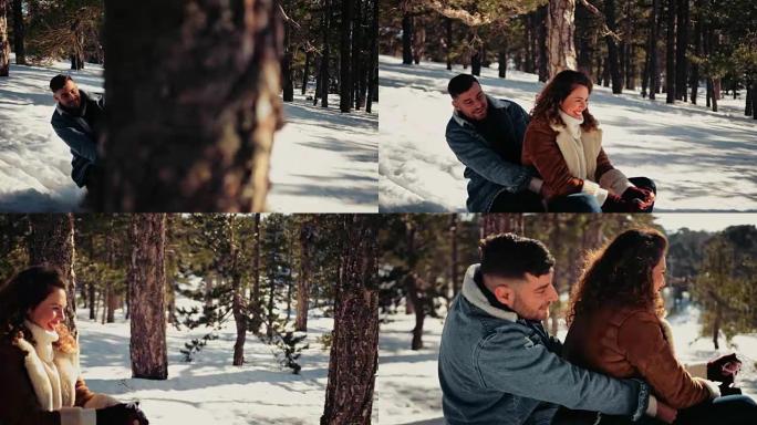 年轻夫妇在雪山森林里玩得开心