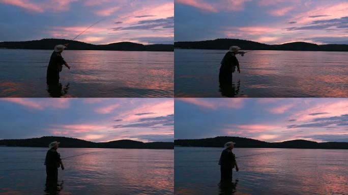 日落时的渔夫剪影