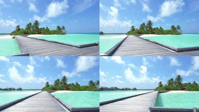 马尔代夫异国情调的木制码头和水上别墅