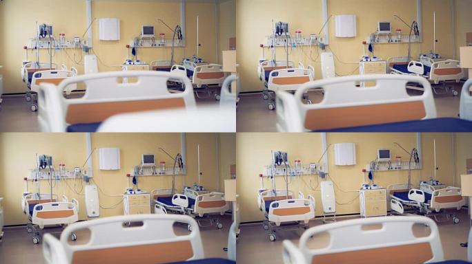 配备三张病床的设备齐全的医院病房