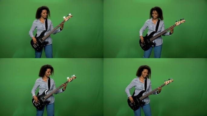 弹吉他的黑人妇女