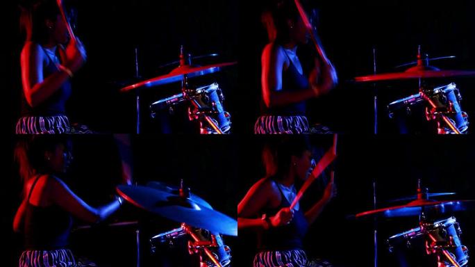 女性鼓手在4k的架子鼓上演奏