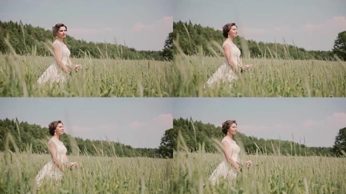 夏天，美丽的新娘穿着漂亮的白色婚纱站在麦田里。风吹她的头发和锥体