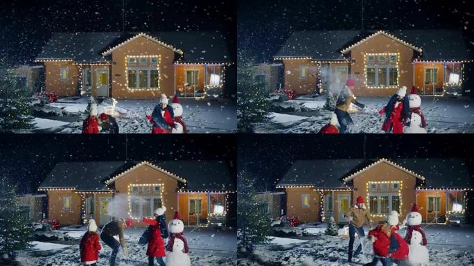 在快乐的冬天晚上，年轻的父亲，母亲和可爱的小女儿在雪球中玩耍，在雪人周围奔跑。父亲拥抱妻子和女儿。在