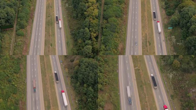 空中: 半挂卡车在收费公路上超速超车其他运输卡车