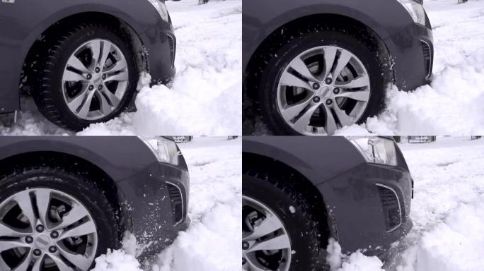 慢动作: 汽车被困在雪中