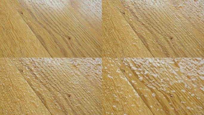 镶木地板。木面上的水滴。