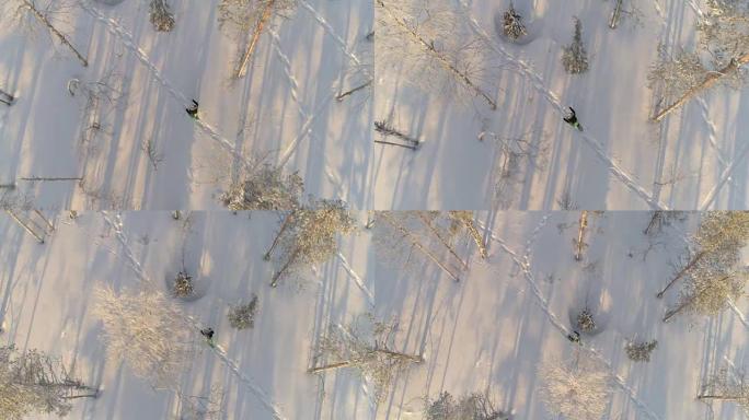 在拉普兰森林的深雪上，空中俯飞在徒步旅行者雪鞋上方