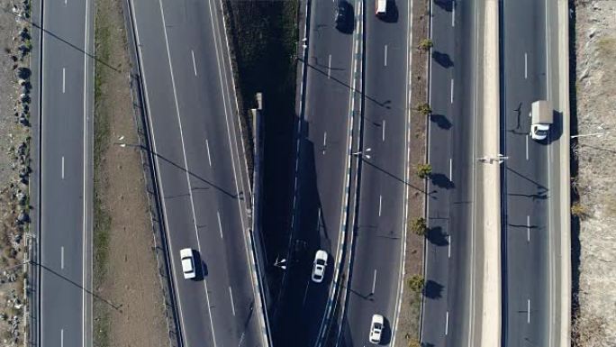 带汽车的城市景观曲线道路的鸟瞰图