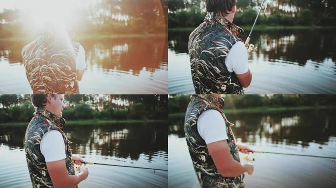 年轻人在湖边的橡皮船上抓鱼。雄性将钓鱼竿扔进水中并扭动卷轴
