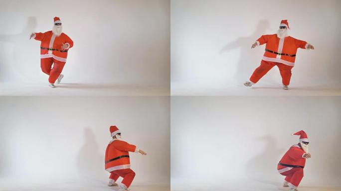 初级有趣的瘦圣诞老人跳舞和玩得开心。