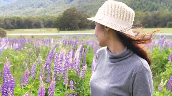 女人在新西兰与羽扇形告别