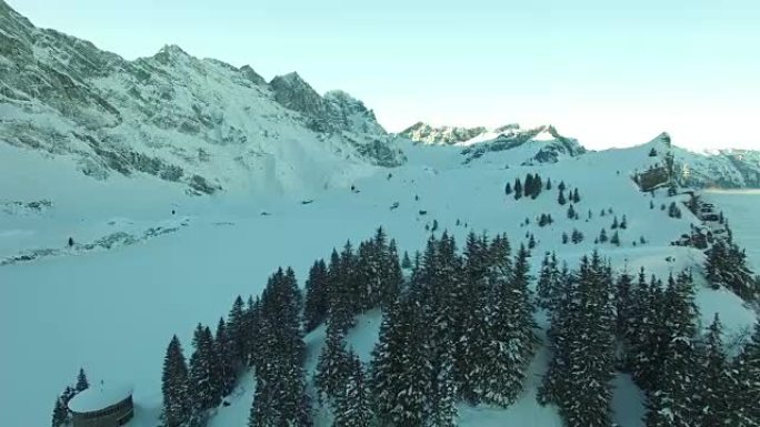 Aerial view of snow covered mountain range with be