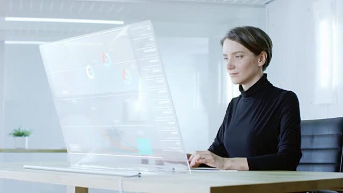 在不久的将来，可再生能源科学家将使用触摸屏透明计算机显示屏。屏幕显示带有流动饼图，图形的交互式用户界