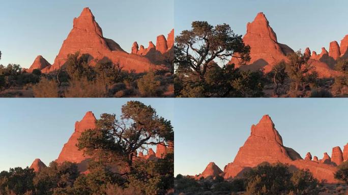 红色日落时拱门国家公园美丽的红色岩石砂岩地层
