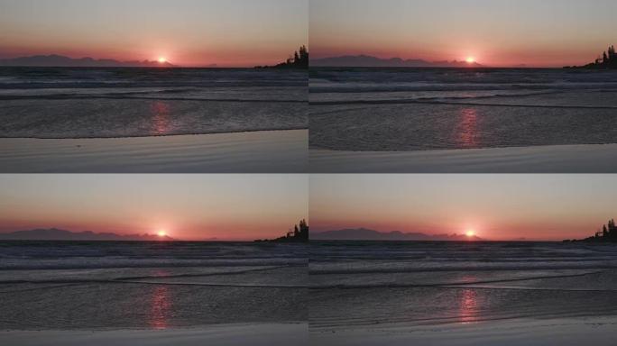 南非开普敦海滩上的日出